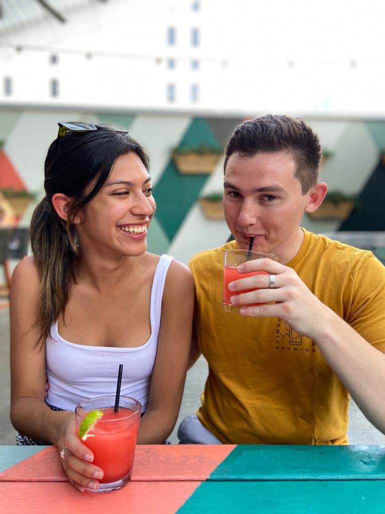Sofia and Riley sharing drinks early in their relationship